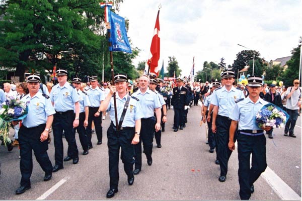 The walking team in the procession at the finish of the "Internationale Vierdaagse Nijmegen" march in the Netherlands